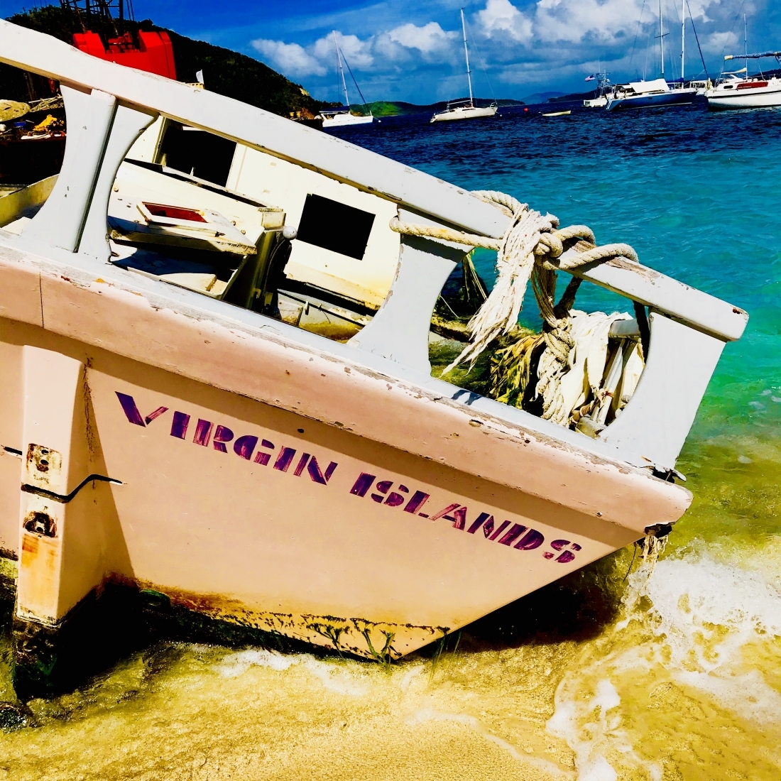A beached vessel with the text "Virgin Islands" on the back.