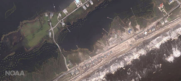 An aerial view of a flooded shoreline.