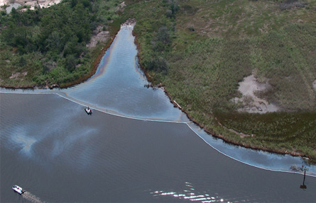 An aerial view of an oil sheen on water.