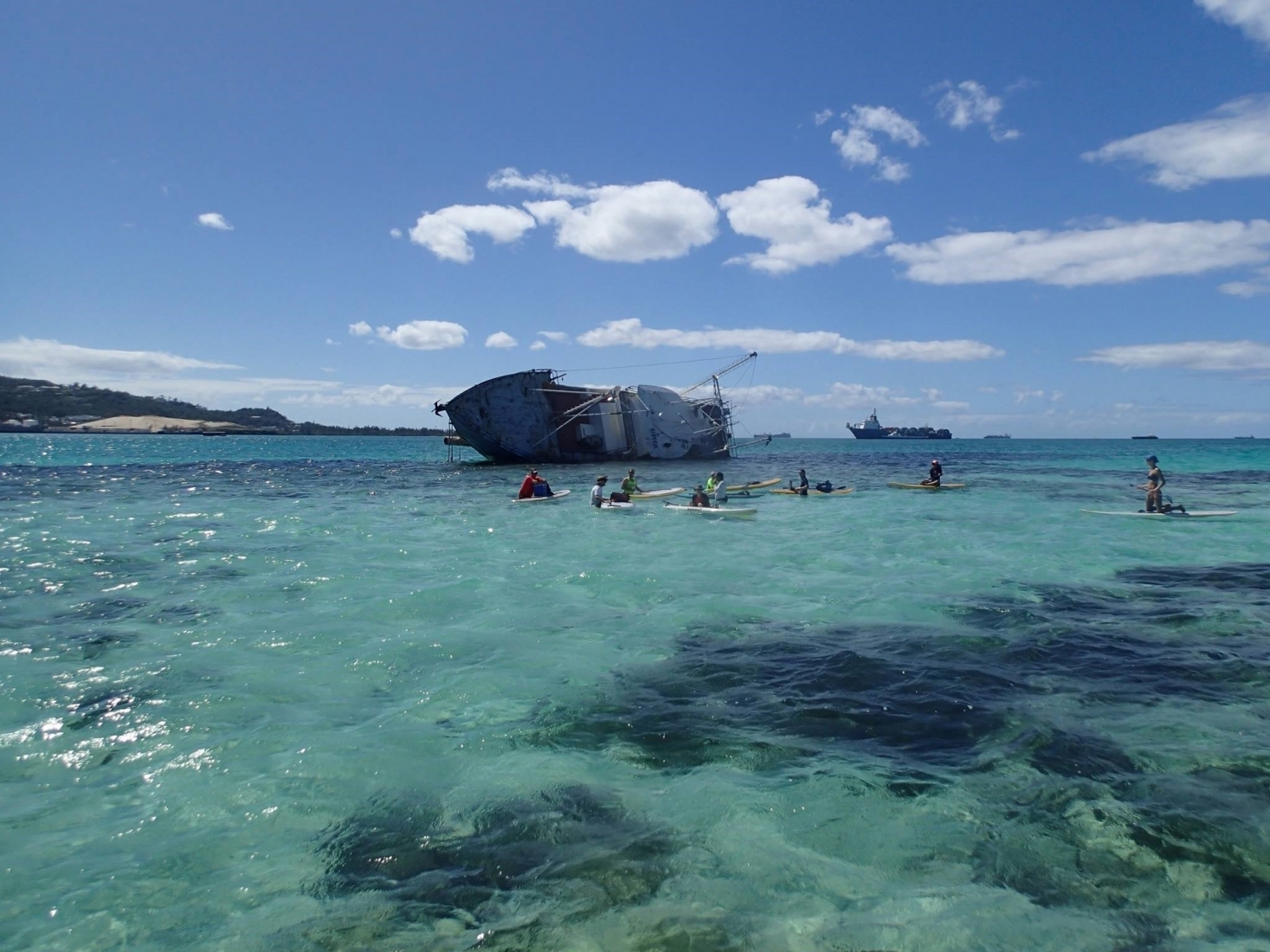 A derelict vessel on a reef.