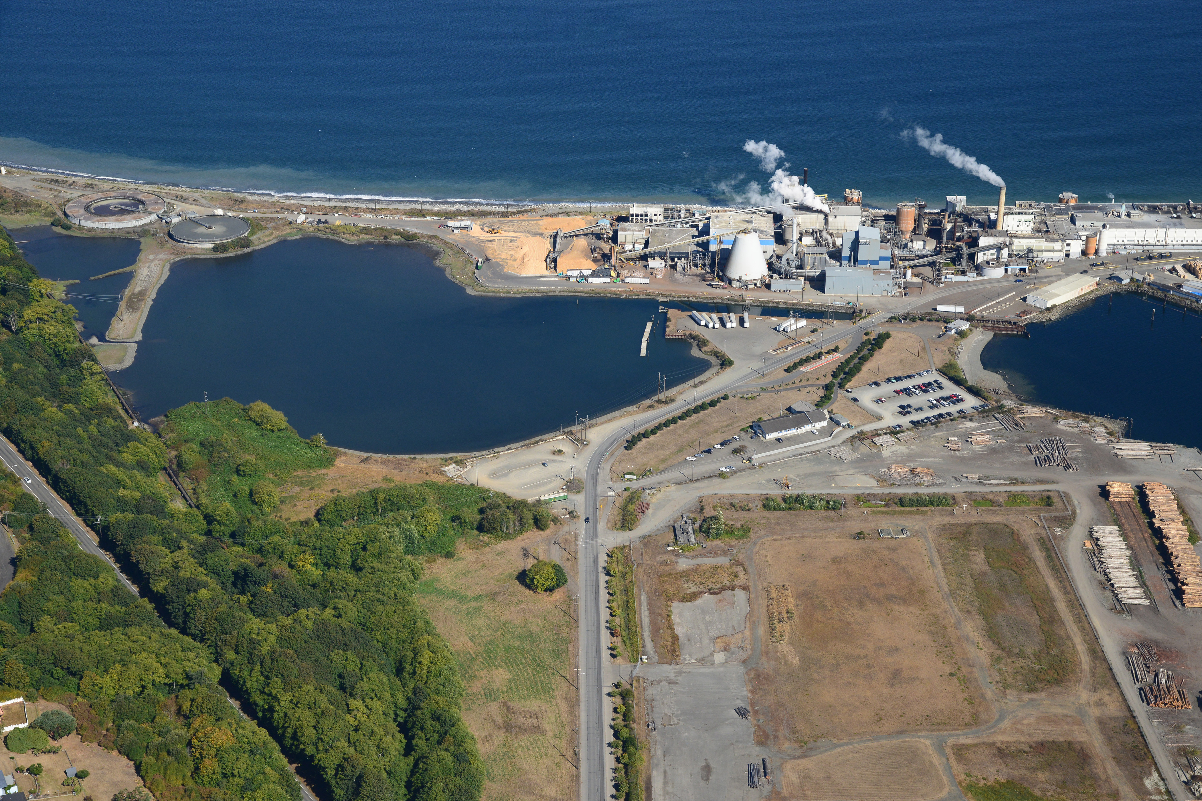 An aerial view of an industrial shoreline.