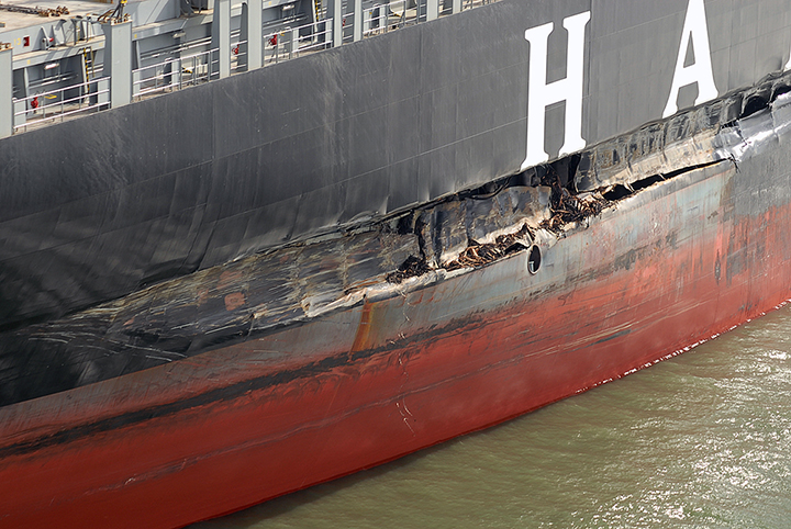 Close up of gash in hull on Cosco Busan cargo ship.