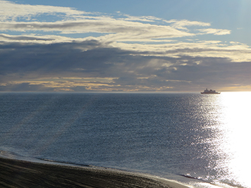 The U.S. Coast Guard icebreaker, Healy, sits just offshore of Barrow.