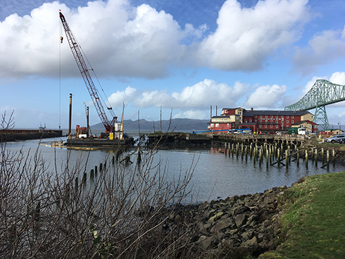 View of a pier from the shore. 