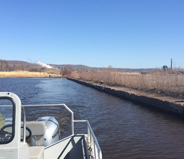 Looking ahead from a vessel on a waterway.