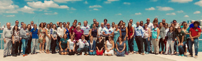 Large group posing for photo.