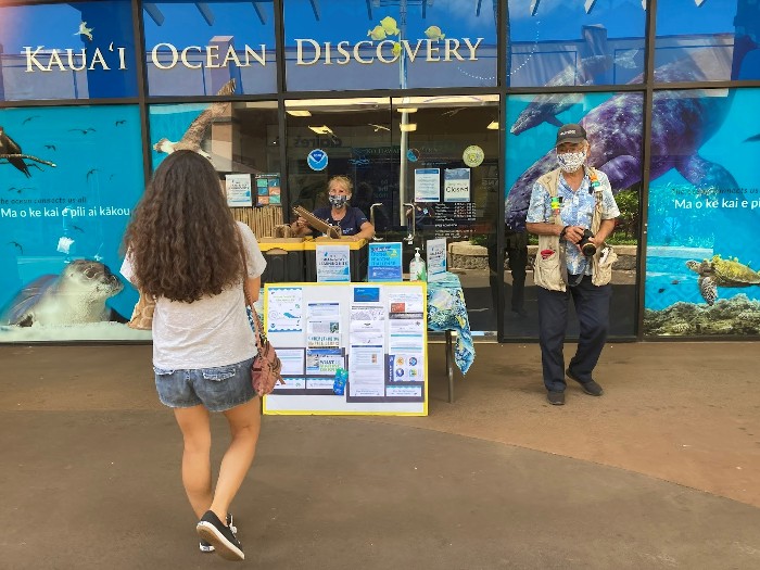 A marine debris booth at a convention.