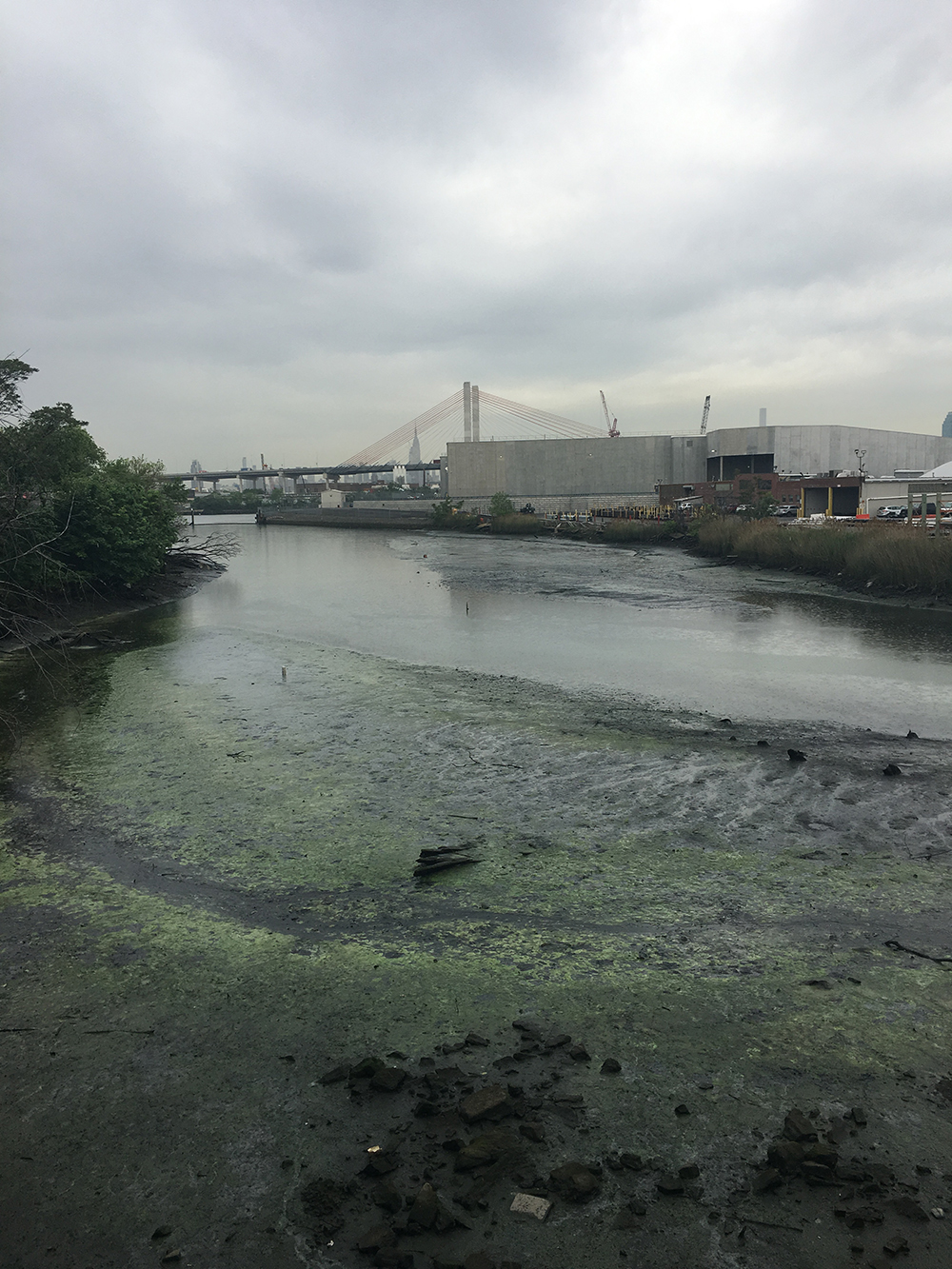 A rundown urban canal. 