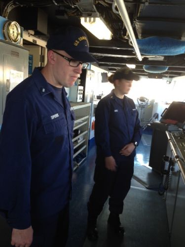 Two officers on the deck of a ship