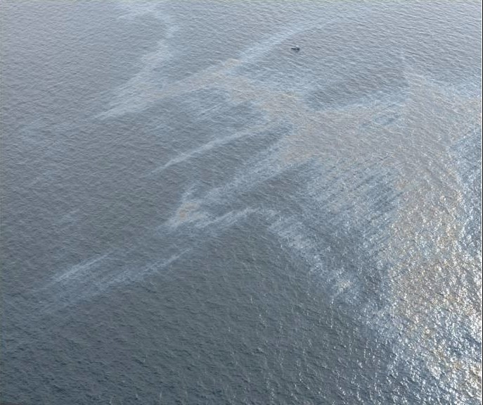 An oil sheen on a body of water. 