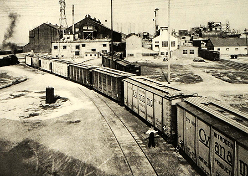 Old photo of train with American Cyanamid written on side of boxcar.