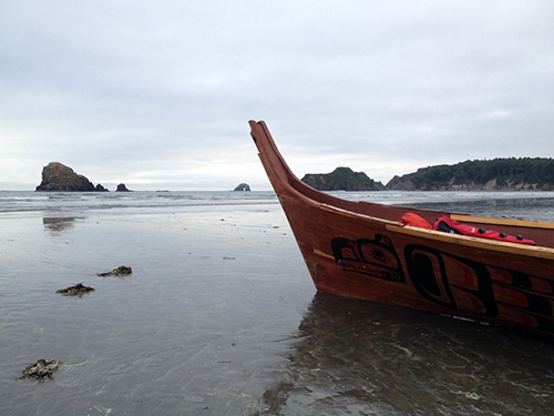 Canoe on a beach.