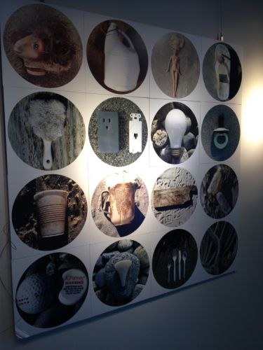 A wall display of photos.