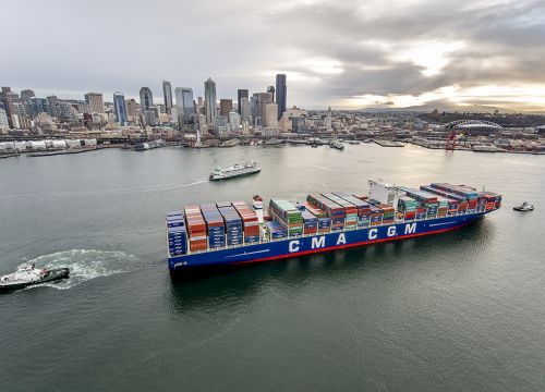The massive container ship Benjamin Franklin pulls into the Port of Seattle.