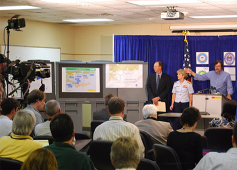 NOAA and Coast Guard at a press conference during Deepwater Horizon oil spill.