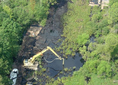 Response operations near the source of the oil sands spill on Talmadge Creek.