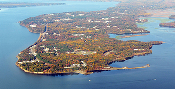 Aerial view of Naval Support Facility Indian Head surrounded by water.