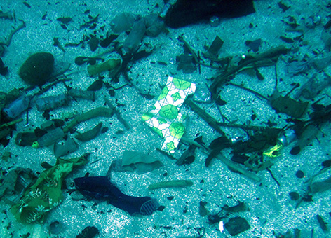 Debris scattered on the ocean floor near the Pacific Islands.