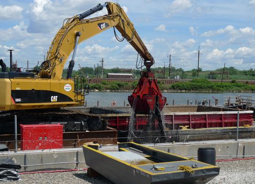 A mechanical dredge pulls contaminated sediment from the bottom of the Passaic R