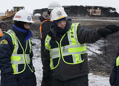 National Transportation Safety Board officials at N.D. train accident scene.