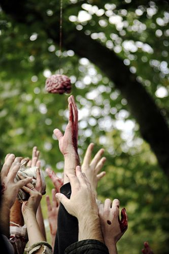 Zombie hands going after brain.