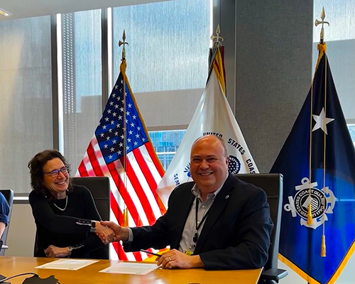 OR&R’s Director, Scott Lundgren, and USCG Director of Emergency Management, Dana Tulis, shake hands following the signing of the ERMA Interagency Agreement. 