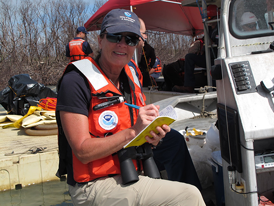 As NOAA SSC, Catherine Berg’s primary area of responsibility was Alaska, but like all SSCs, she served wherever needed around the country. In this photo, she is performing field work in Puerto Rico following Hurricane Maria. Image credit: NOAA.