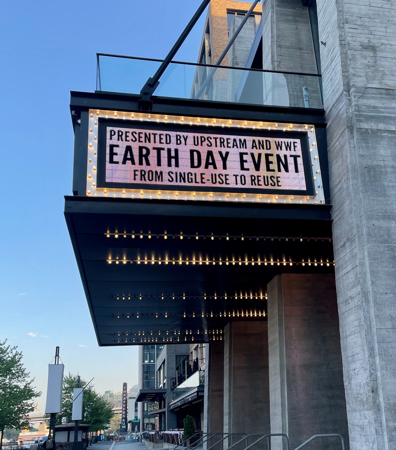 An event sign that says "Earth Day Event."