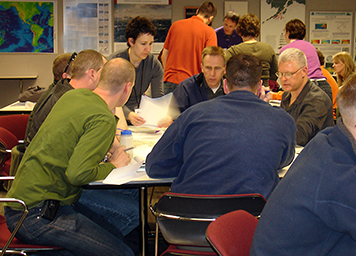 A group of students work together during an SOS class.