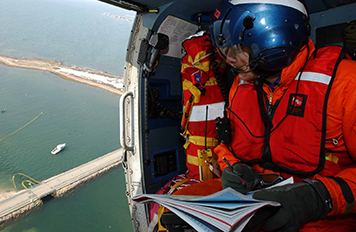 Photo: Responder in helicopter.