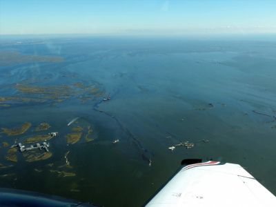 An aerial view of oil in water. 