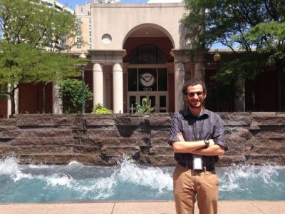 Man standing in front of wave fountain. Image: NOAA.