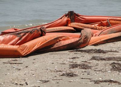 Oiled boom on a Louisiana beach.