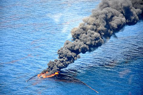 Smoke billowing from water.