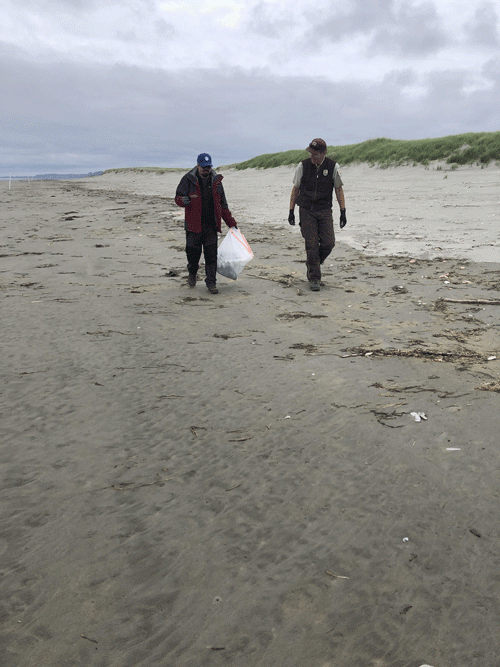 Two people on a beach.