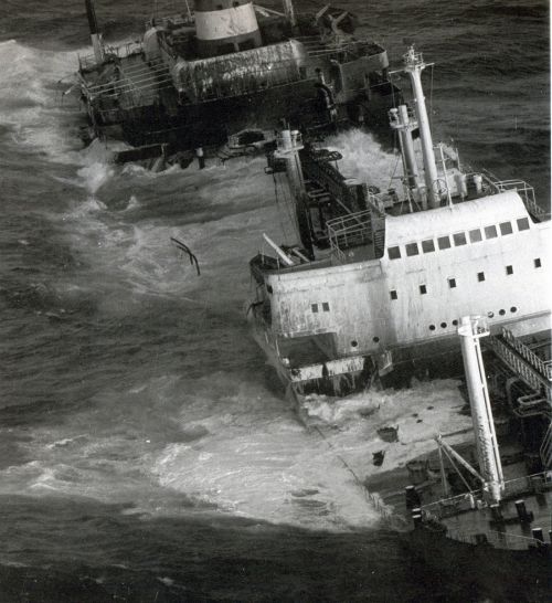 Ship sinking in the ocean.