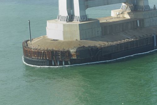 Damage to the base of the bridge.