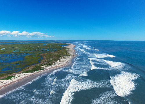 Aerial view of an ocean beach.