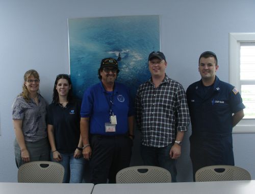 A group of people posing for a photo. 