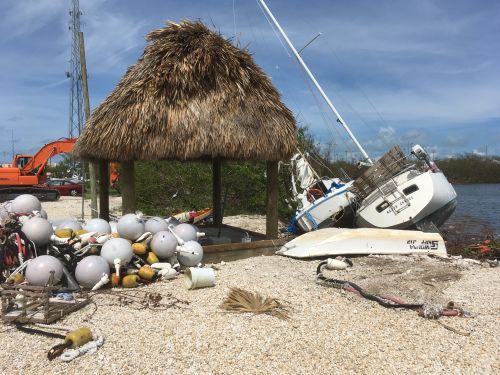 Marine debris and a vessel on a dock.