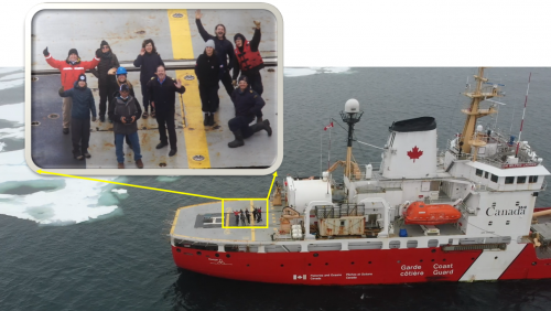 A photo of a group of people on a vessel.