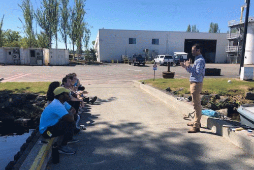 A group of people outside a building.