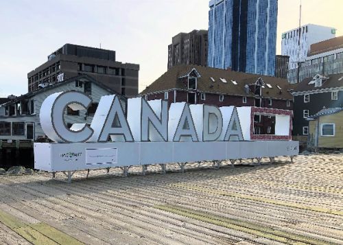 Letters that spell "Canada" outdoors. 