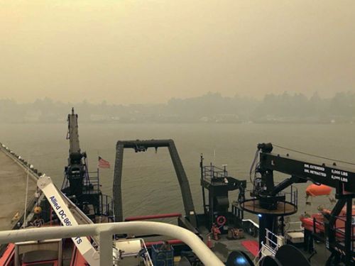 View of a hazy skyline from a vessel.