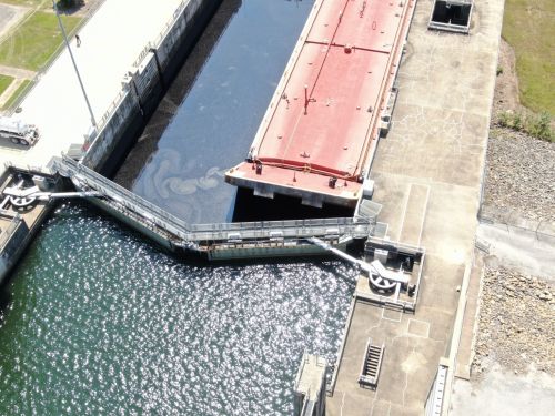 Overhead view of a barge in locks.