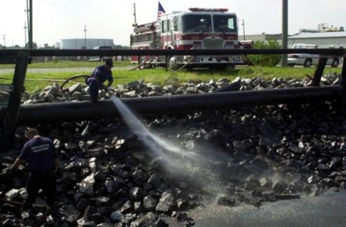 Individual straying water on oily rocks. 