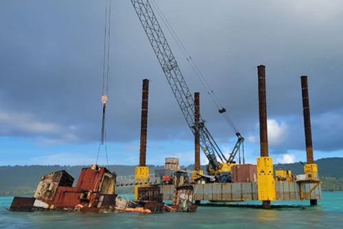 Heavy equipment used to remove vessel from the water.