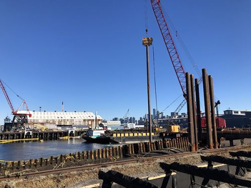 Dock with industrial scene in the background. 