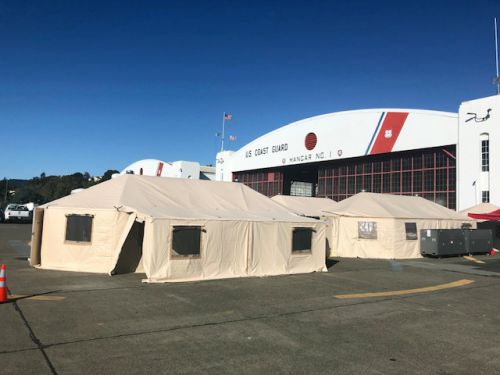 Tents on a parking lot.