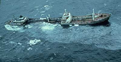 A large ship sinking in the ocean.